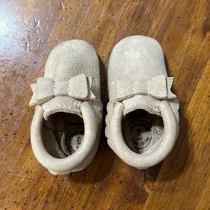 Weathered tan moccasins
